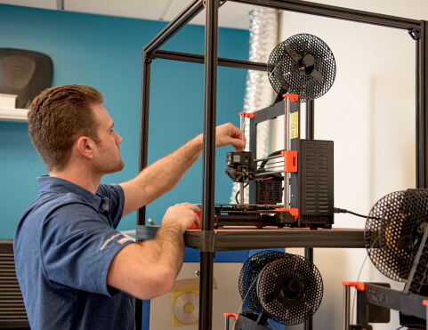 man working on a machine