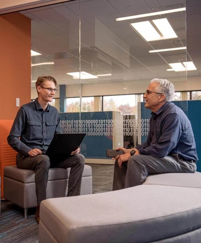 Medical Device Consultants discussing new medical product design ideas at Sunrise Labs office